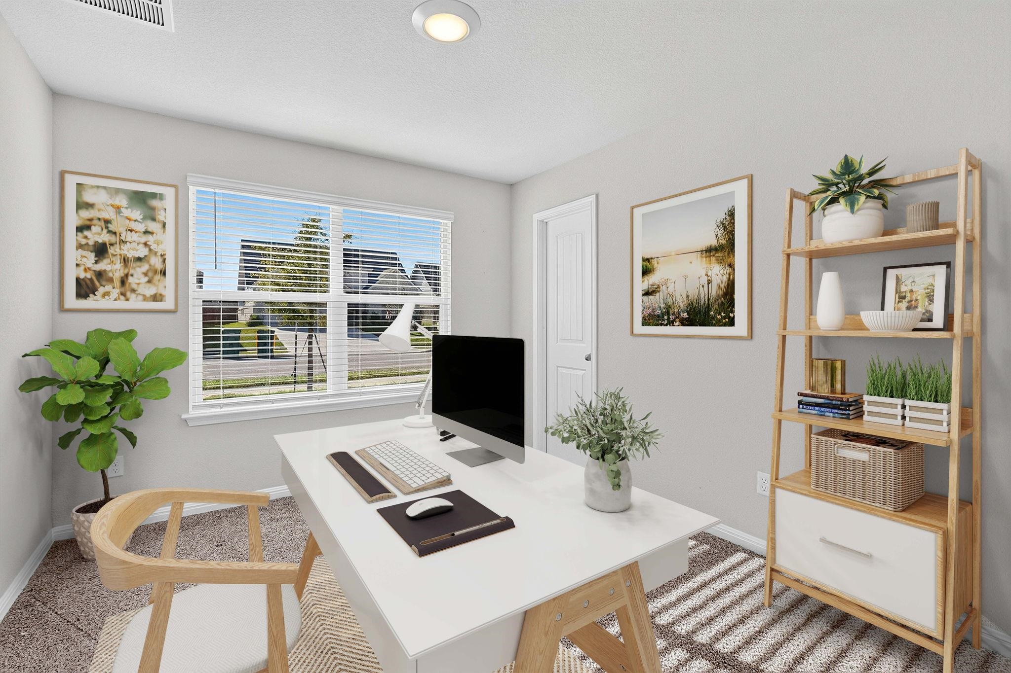 Recessed lighting illuminates this seamless open floorplan connecting the living area and kitchen.