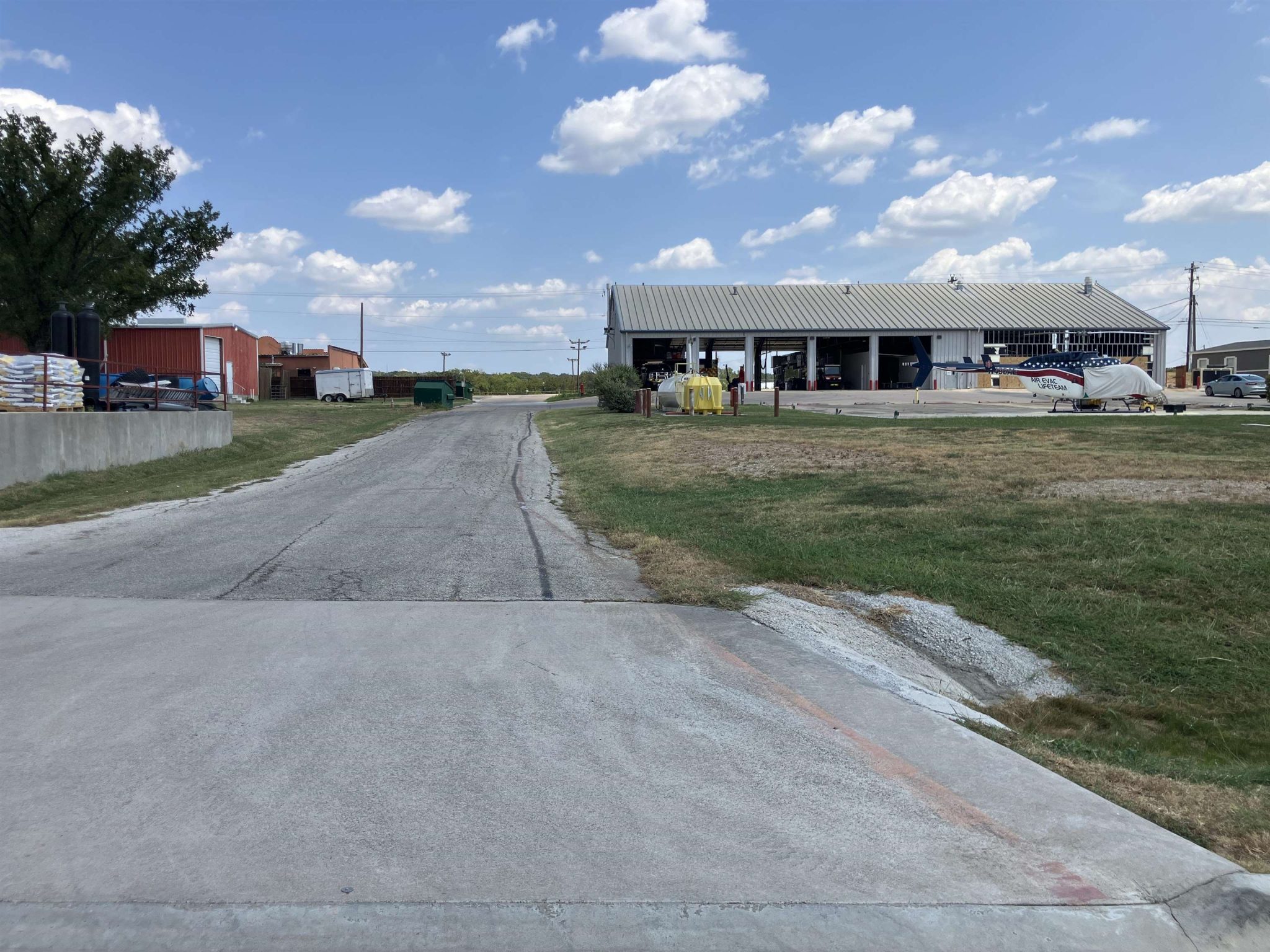 PAVED ALLEY BEHIND LOTS