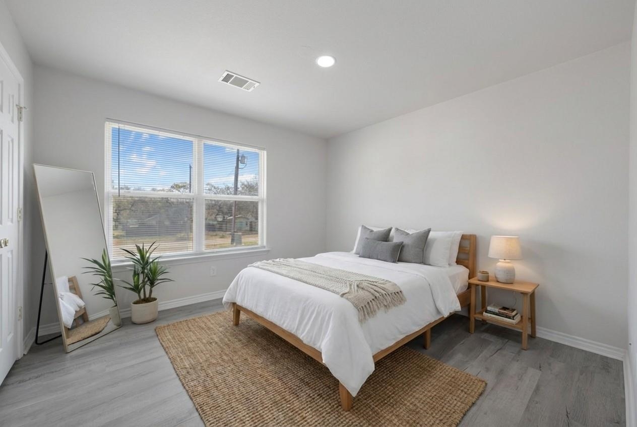2nd Bedroom featuring light wood-style floors and recessed lighting. *Virtually Staged