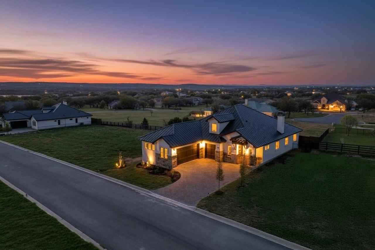 What a glorious evening in this custom home with gorgeous night time lighting!