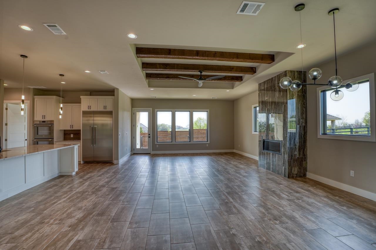 Designer lighting and lots of windows make this light bright and airy.
