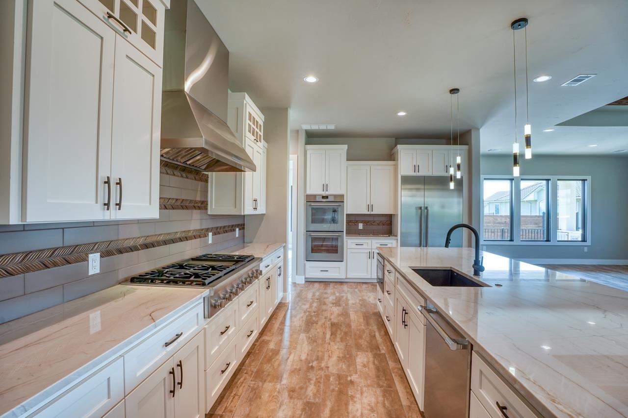 A favorite part of the home for anyone.  Stainless steel appliances with gas cooktop and double oven