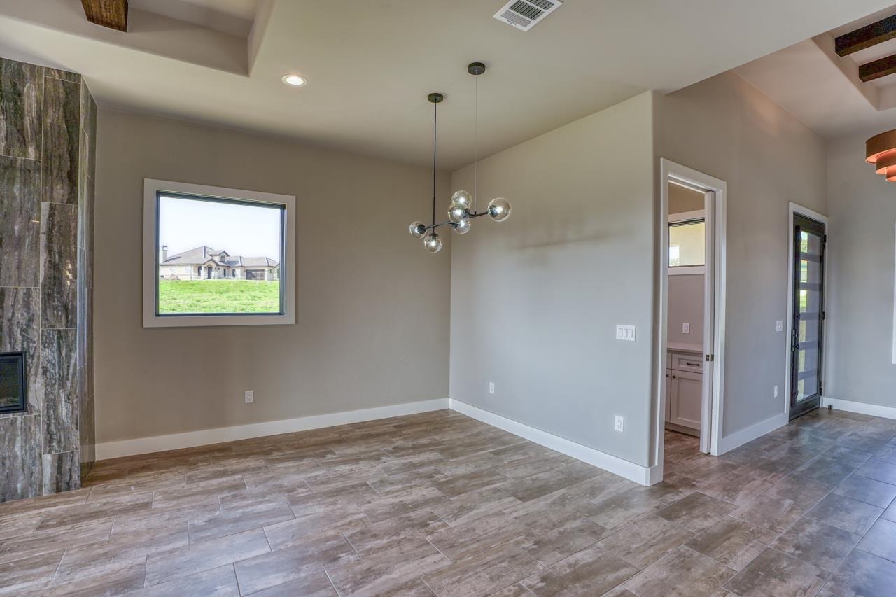 Want a round, square or rectangle dining table? This area will lend itself to your choice!