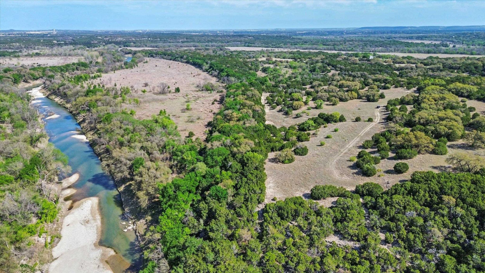 Rear of acreage borders river side - several gated entry points