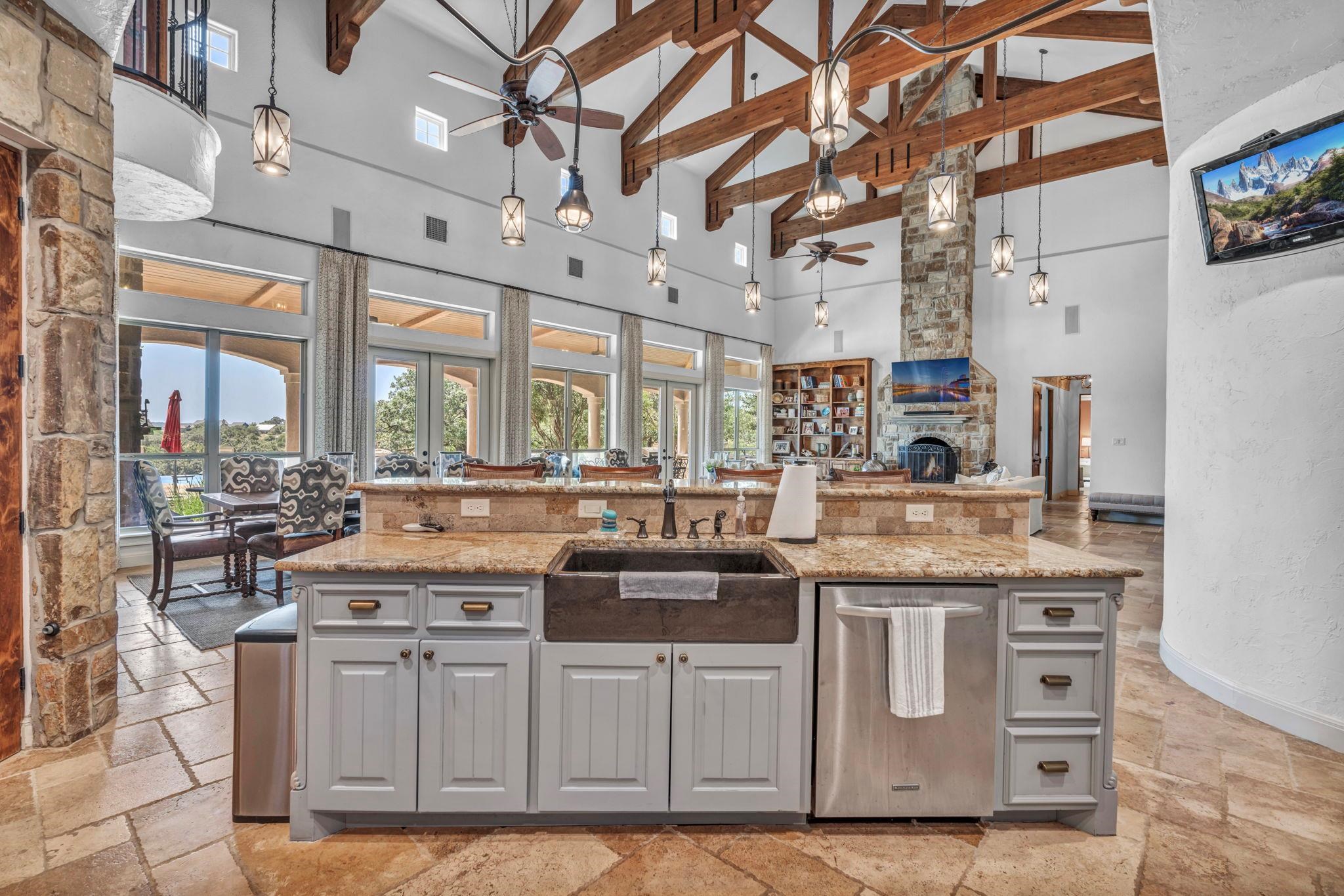 The heart of the home, open floorplan connecting the dining and living room with ample natural light