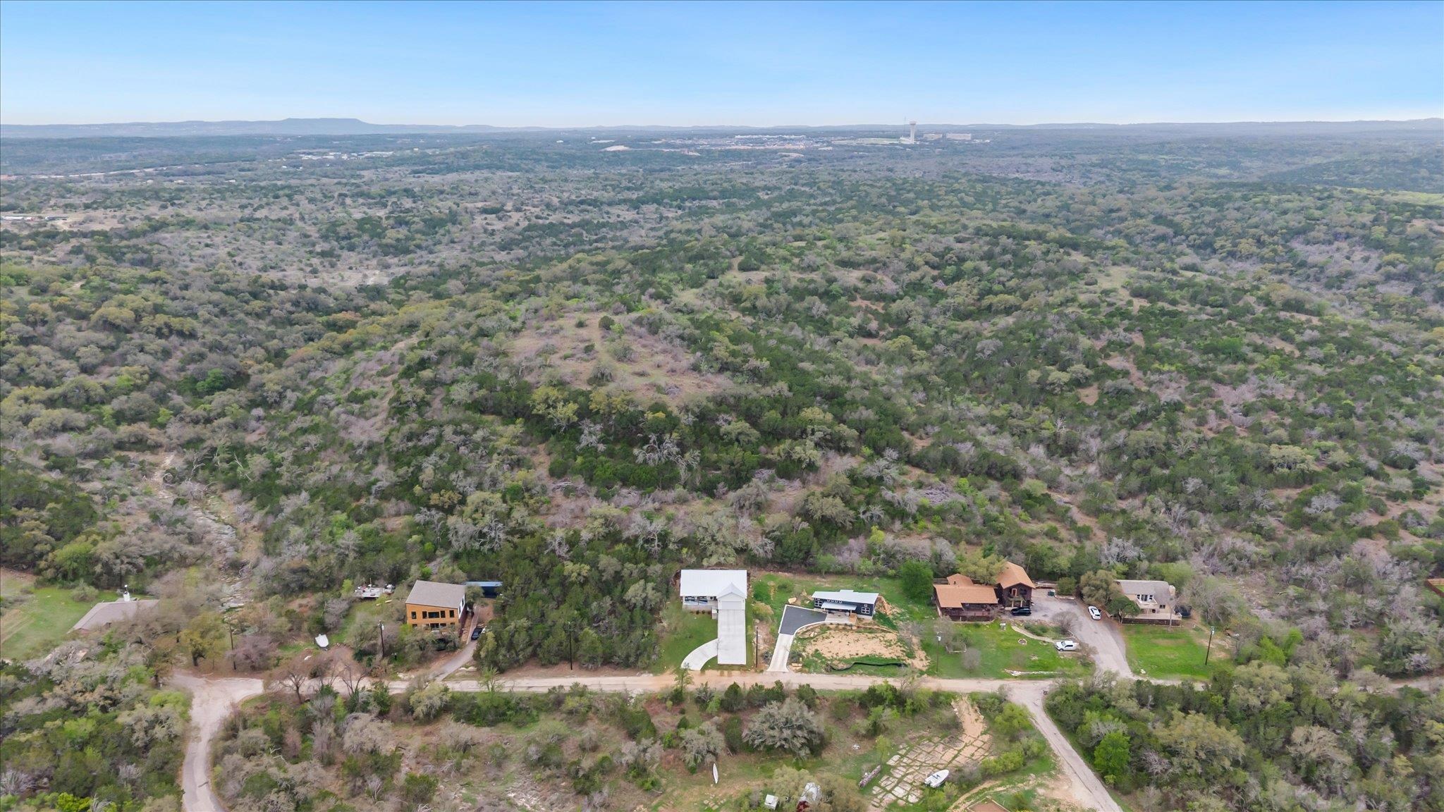 View of the spacious open area behind the home
