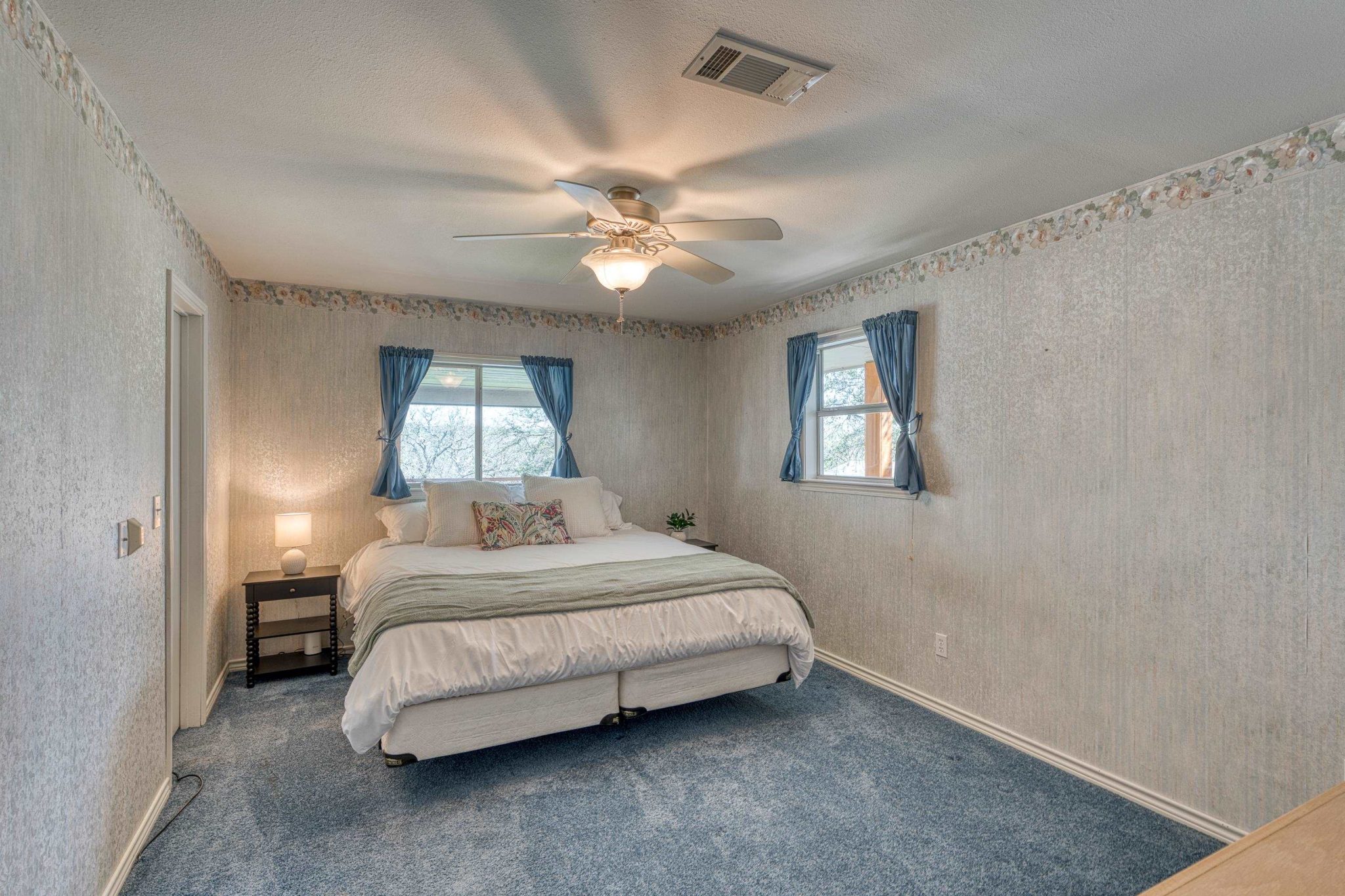 Large primary bedroom on the 1st floor. Features 3 closets and an en-suite bathroom.