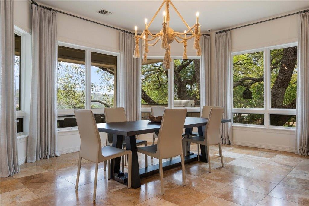 The wall of windows looks out onto the water views.