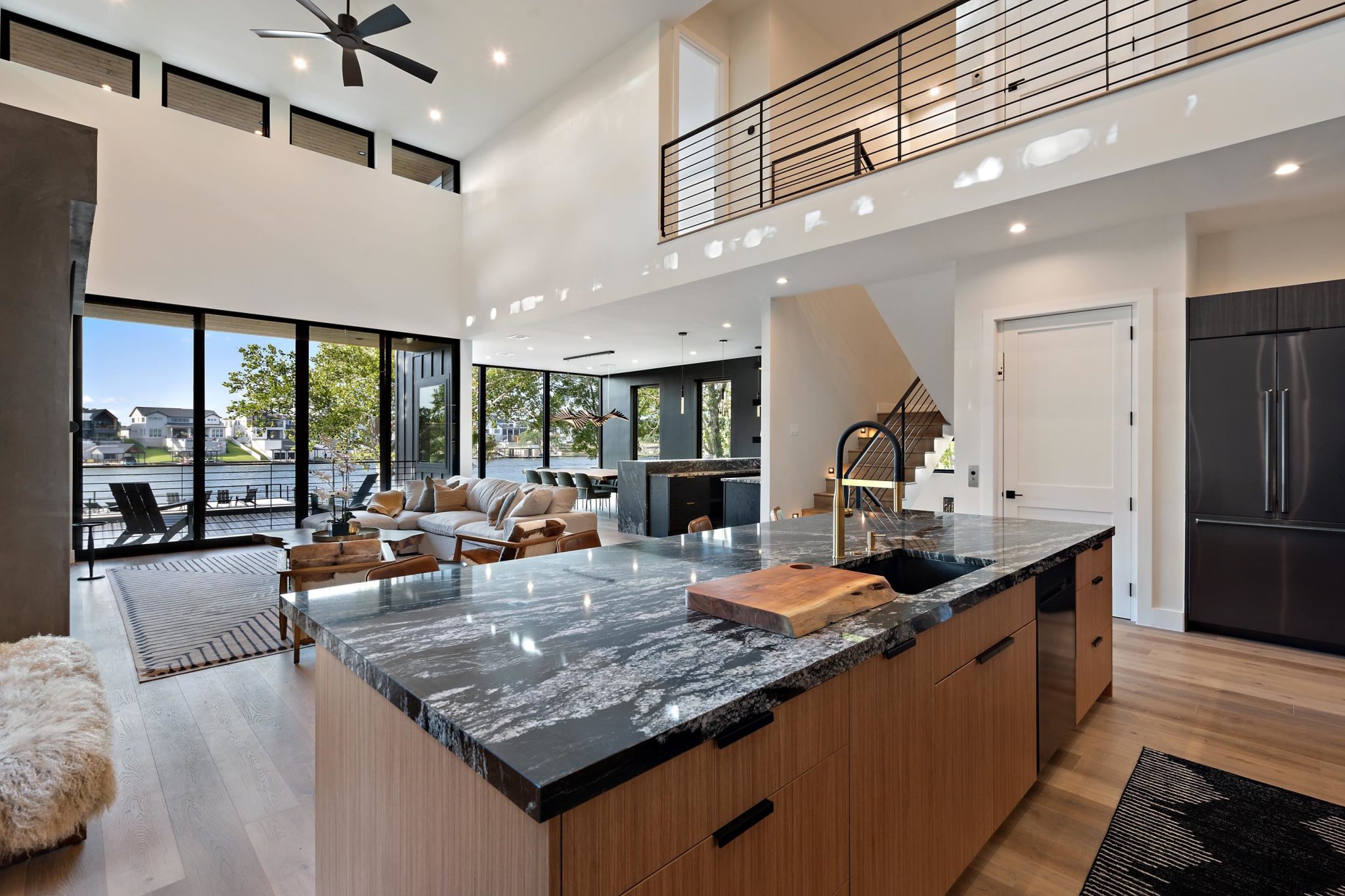 Black forest granite countertops & walls of glass.