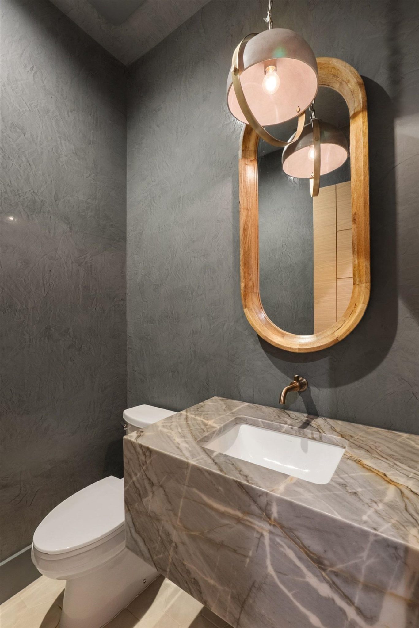 Exquisite floating half bath counter is located inside the home