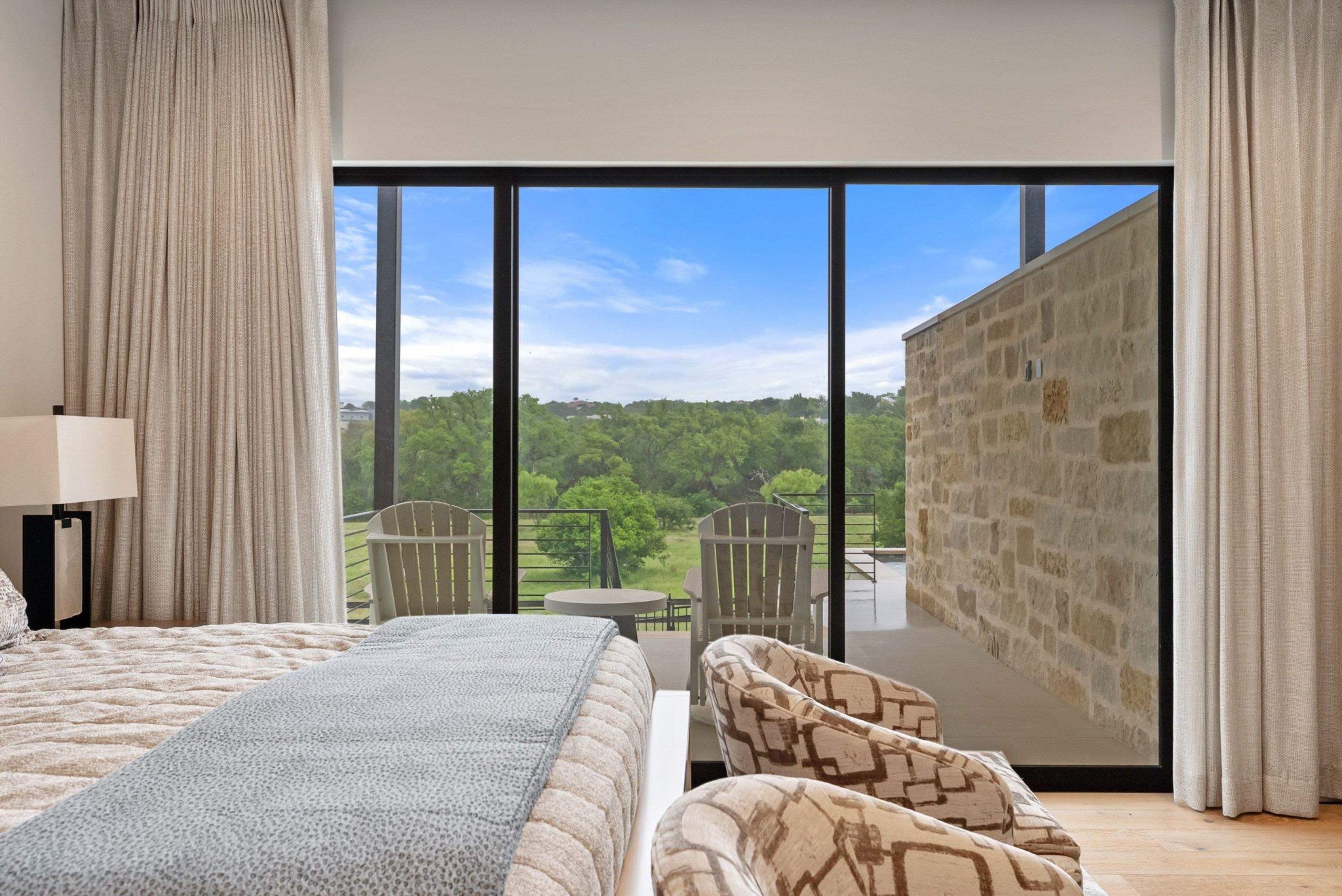 Views, and sliding doors to bring in the outdoor serenity, equipped with its own private patio