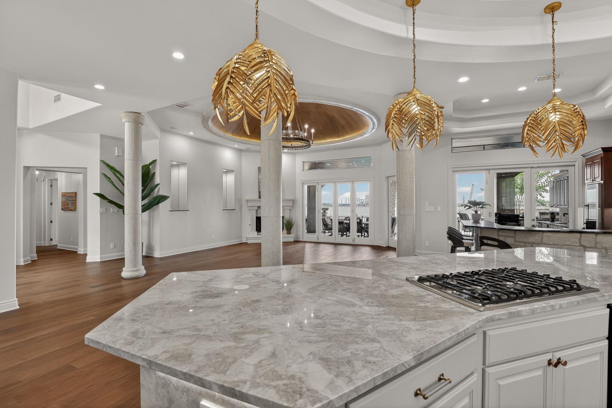 METAL PALM PENDANT LIGHTING IS SIMPLY STUNNING, TYPICAL OF THE CURATED DESIGN 113 ESTATE DR. OFFERS!