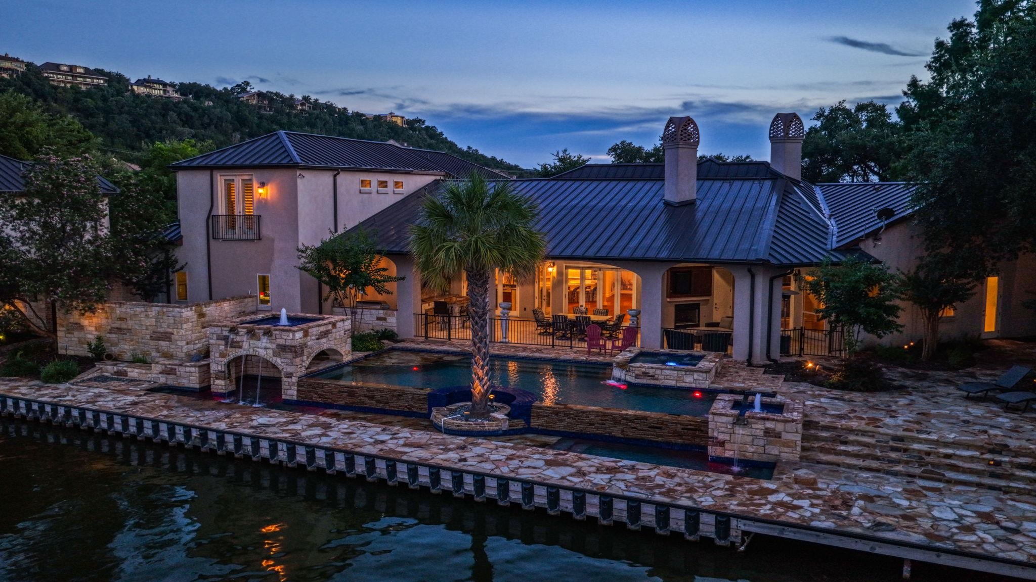 113 ESTATE DRIVE IS UNIQUELY BEAUTIFUL IN THE DAY...EQUALLY SPECTACULAR AS THE SUN SETS!