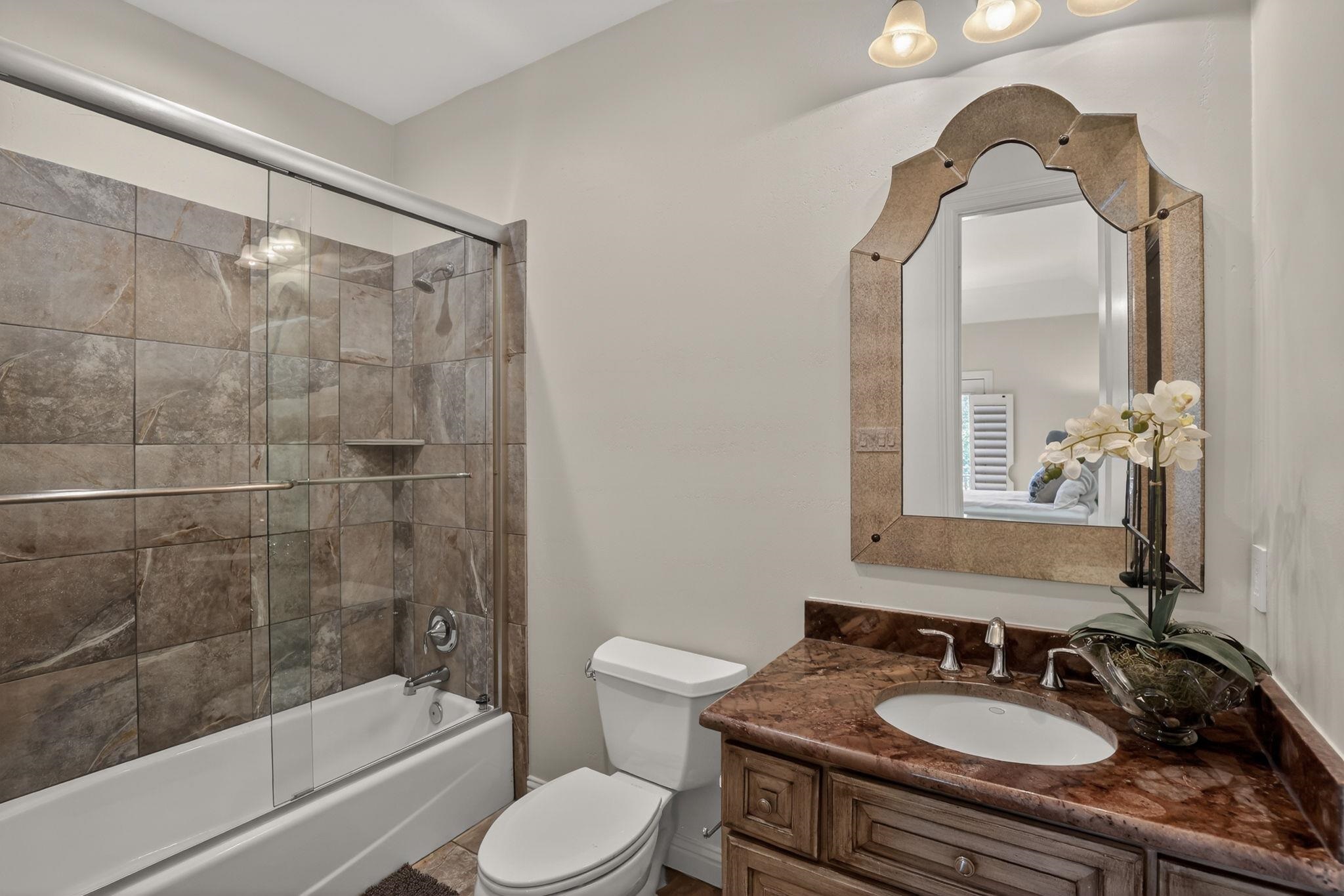 PRIVATE BATHROOM FOR UPSTAIR (STREETSIDE) GUEST BEDROOM.