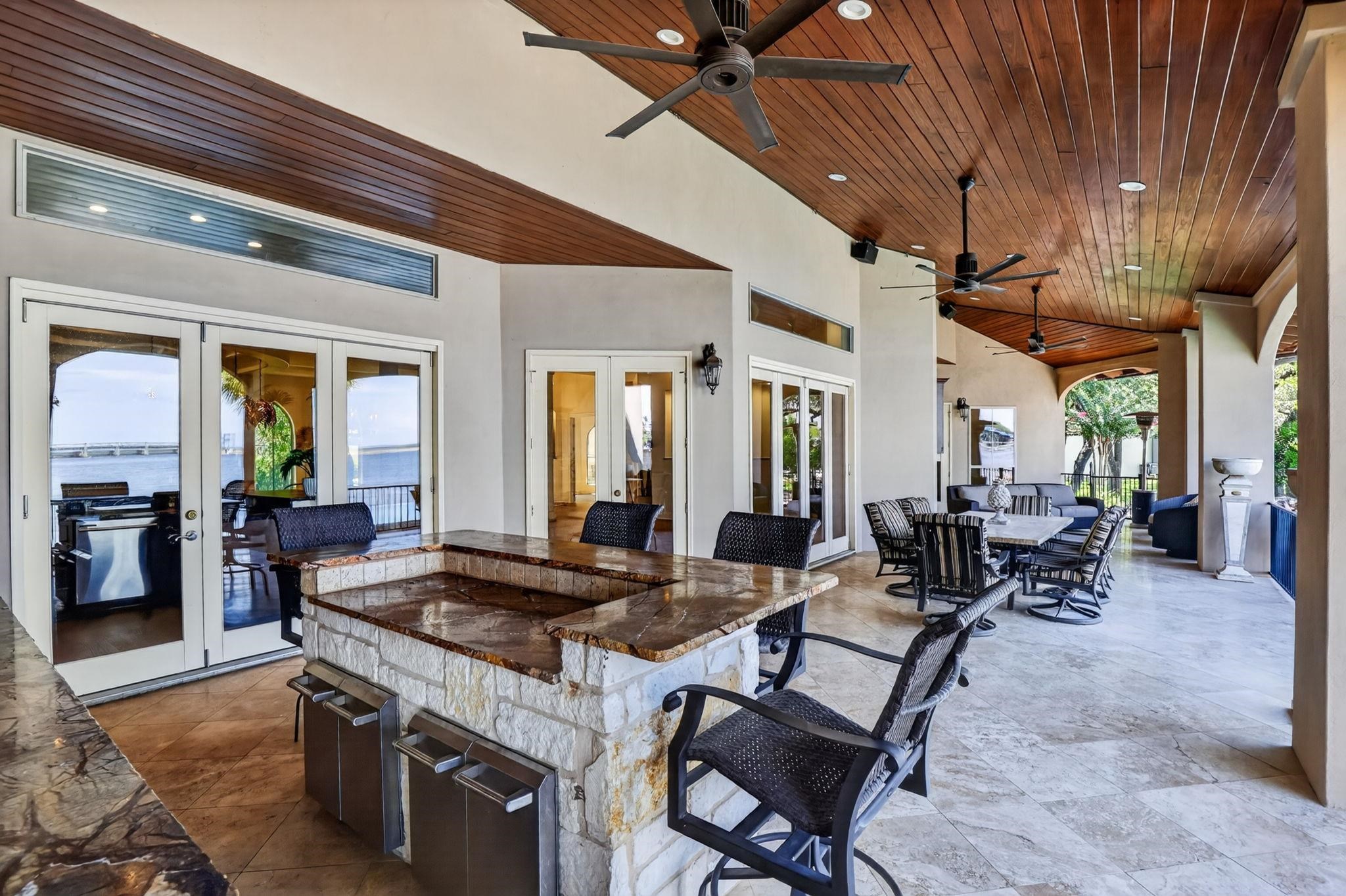 MULTIPLE DINING AREAS, OVERLOOKING LAKE LBJ! EVERY AMENITY TO EXPERIENCE THE BEST LAKE LIFE!