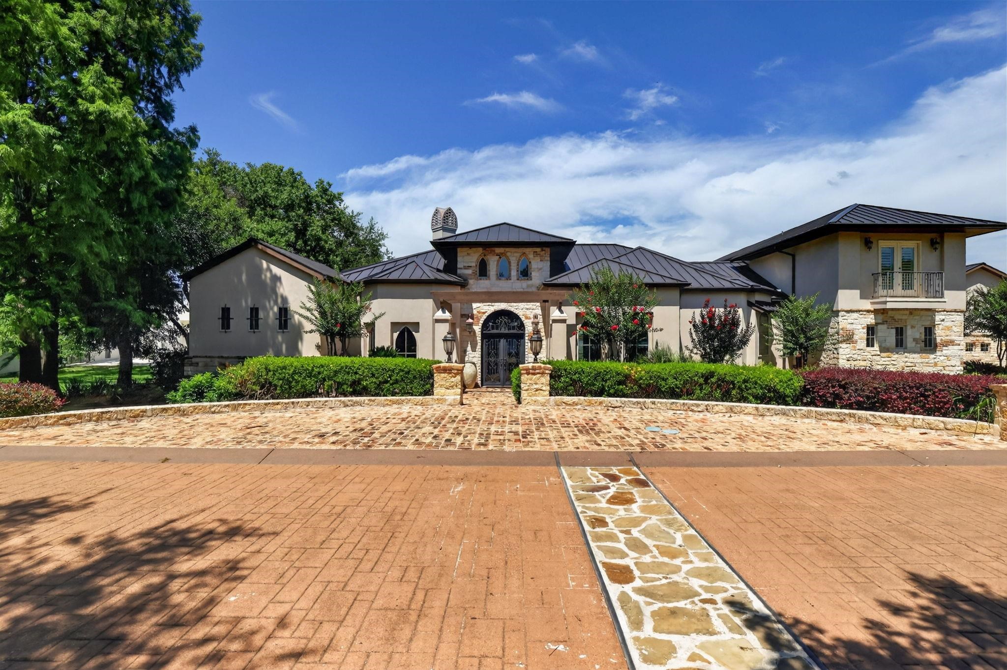TIMELESS MATERIALS GRACE THIS STATELY WATERFRONT PROPERTY! 2026 CURATED UPDATES INSIDE-OUT!