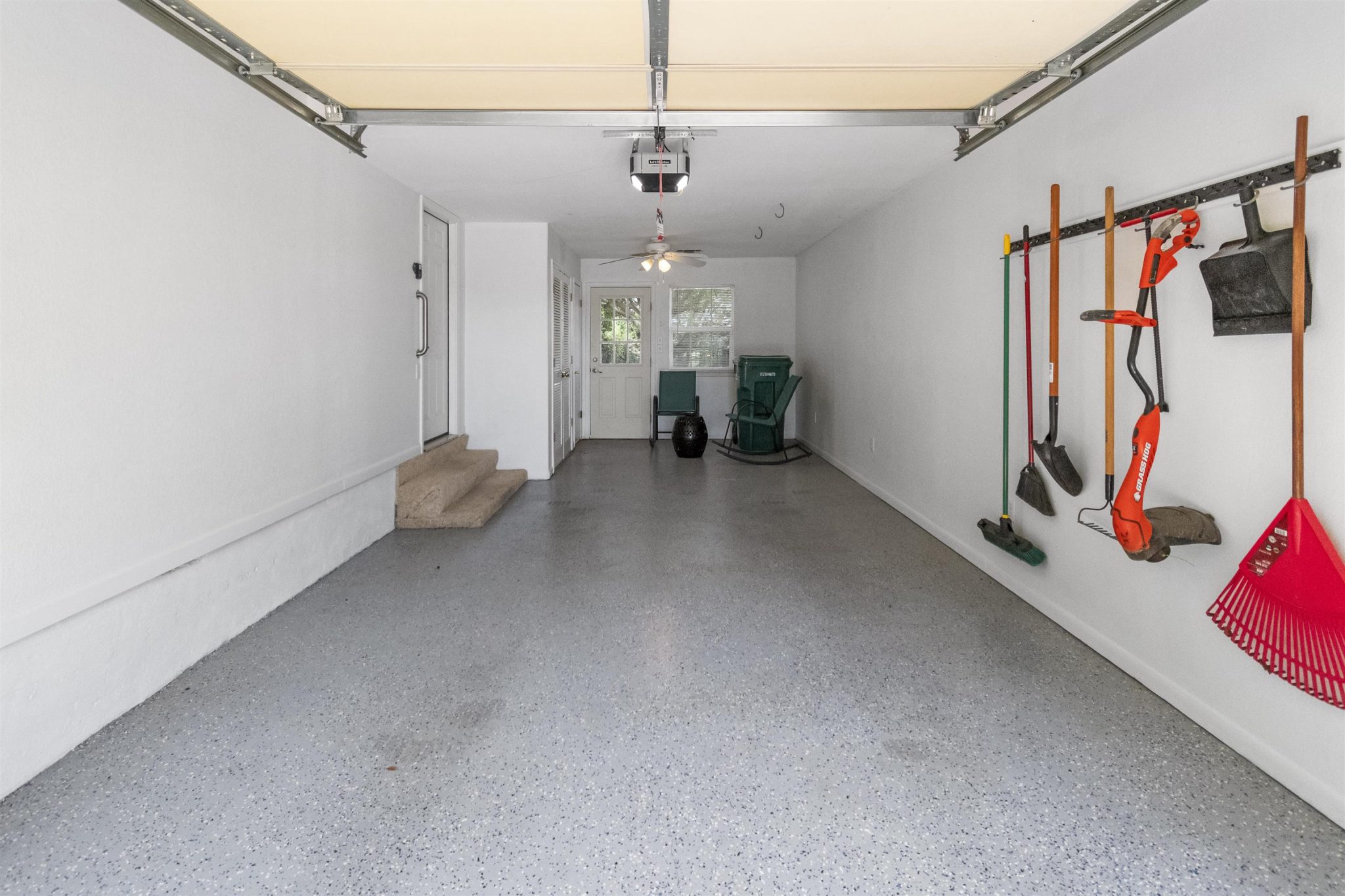 Attached 1 car garage with access to backyard