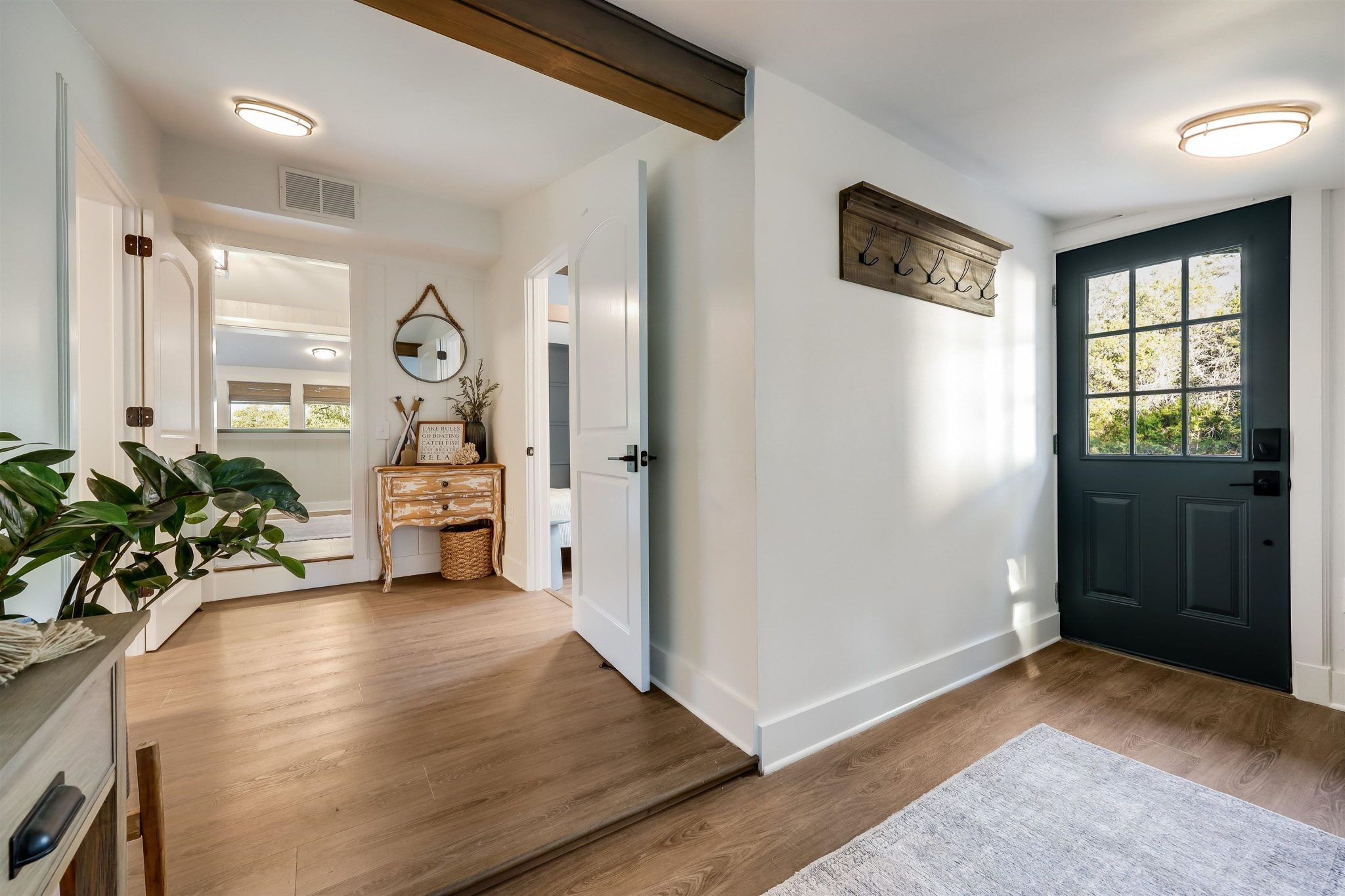 Welcoming entry with beamed ceiling