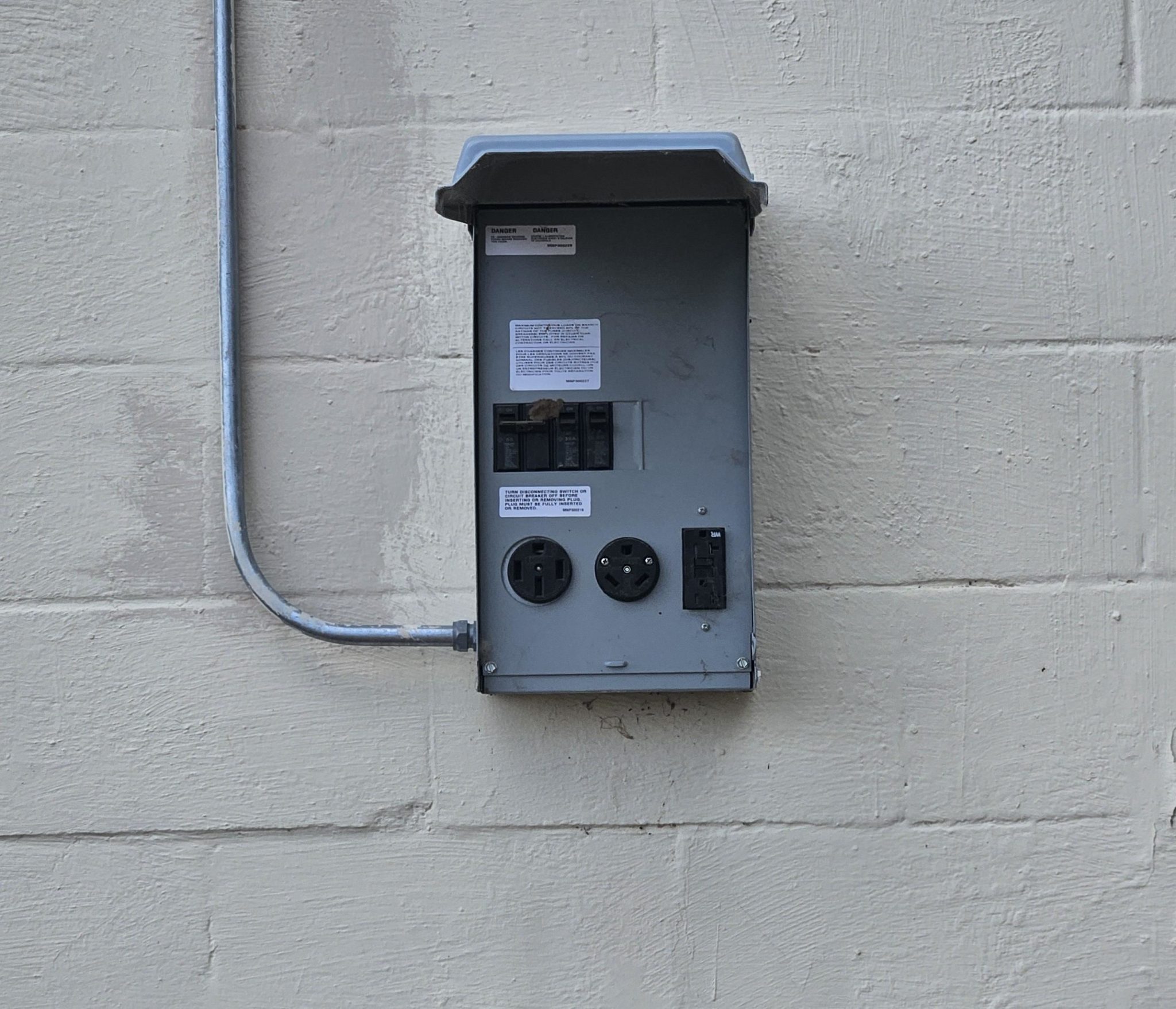 RV power hookup with 30/50 amp outlets