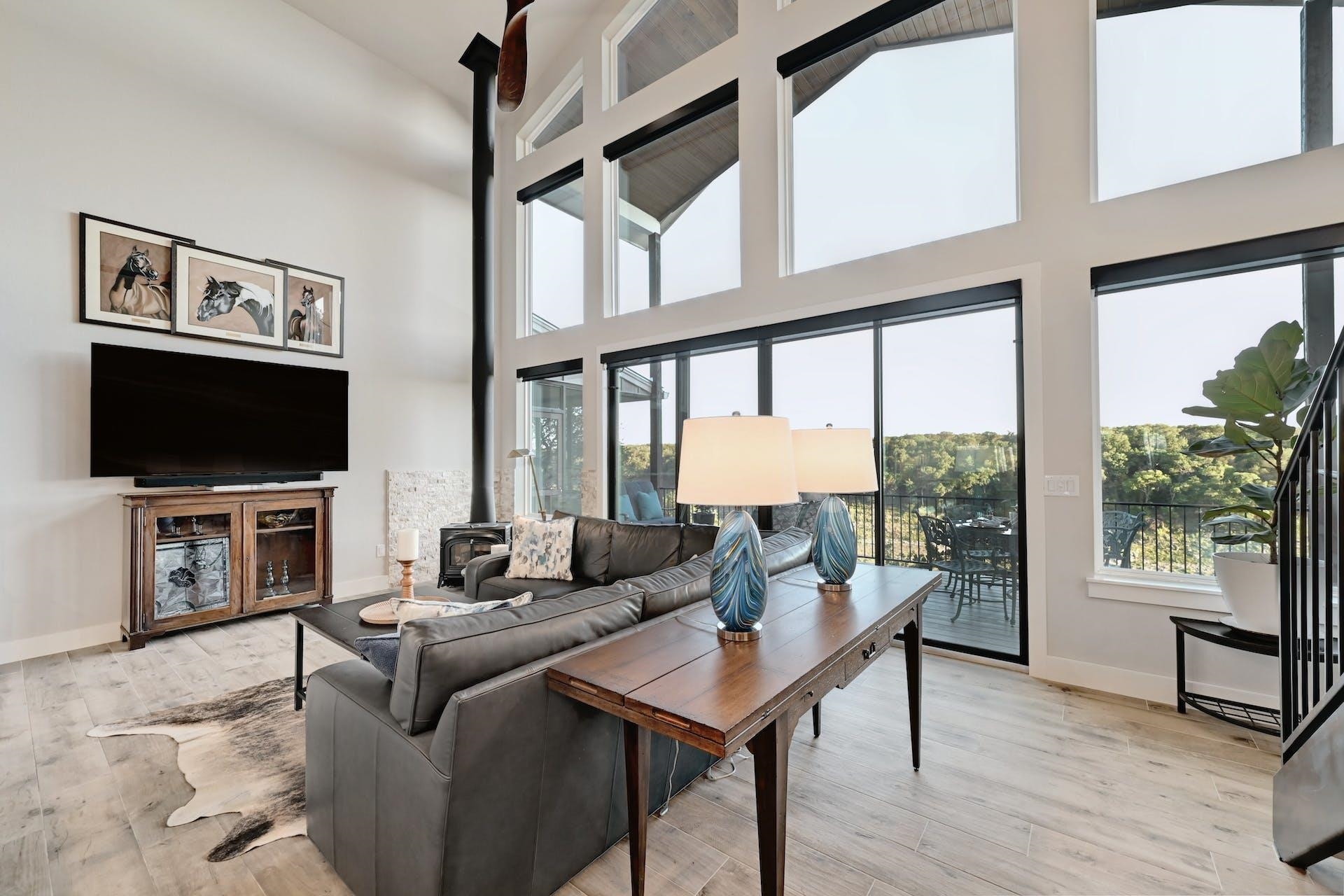 Features include Hunter Douglas motorized shades and a Vermont Castings wood-burning stove.