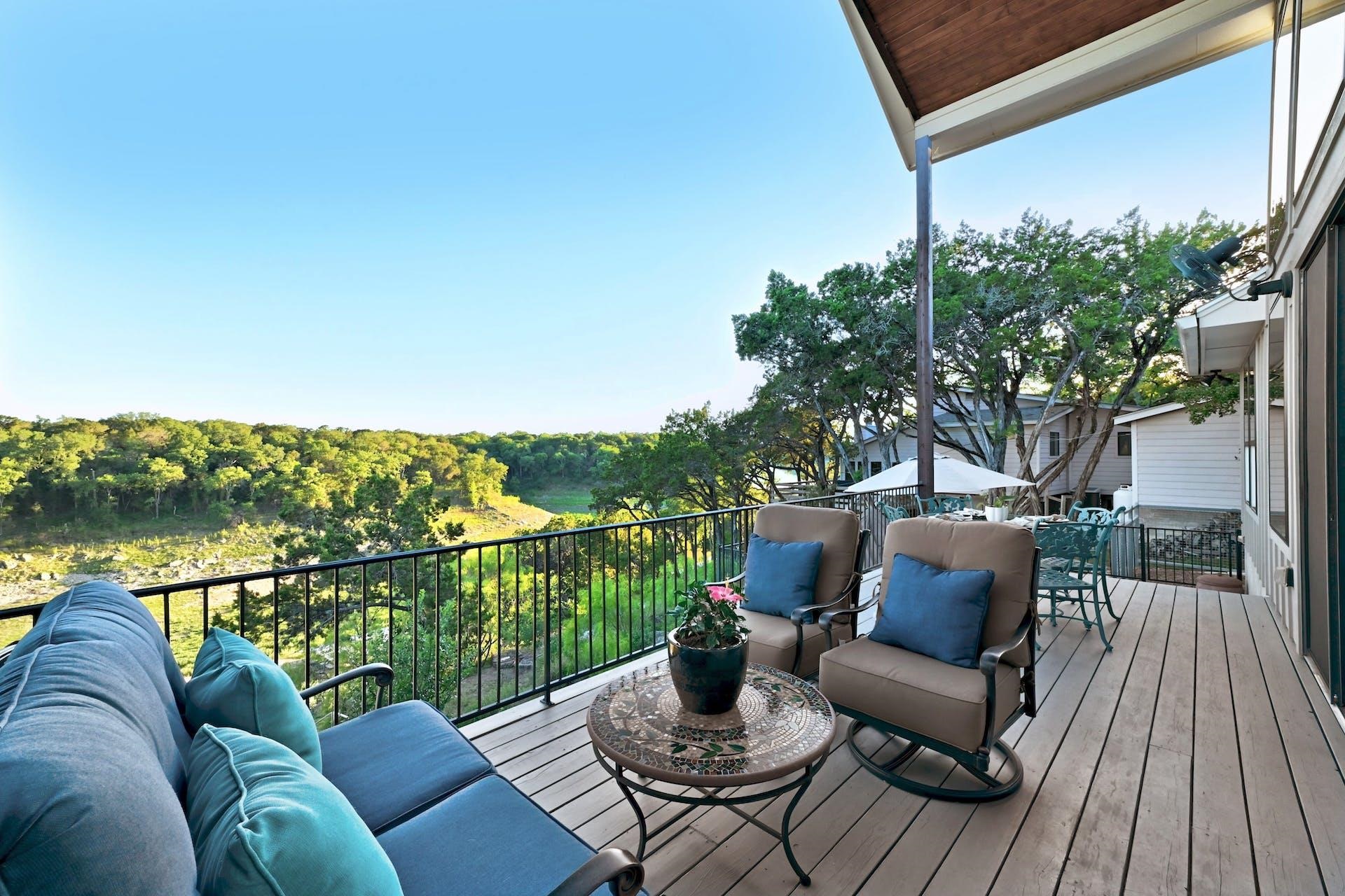Water, tree and sky views from every angle of this stunning property.