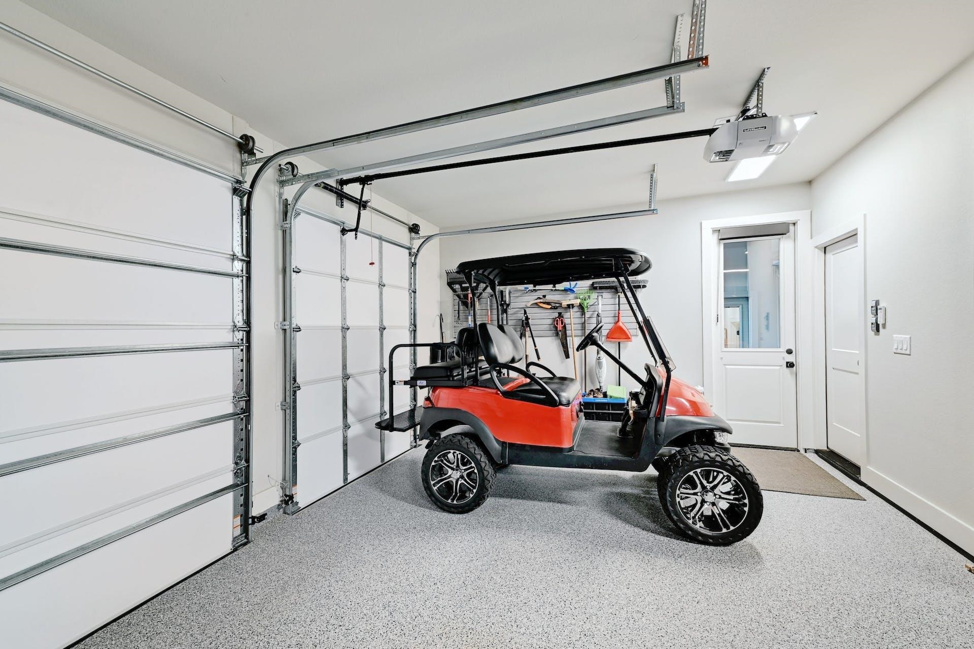 Finished garage offers versatility with a mini-split air system, room for multiple vehicles & more.