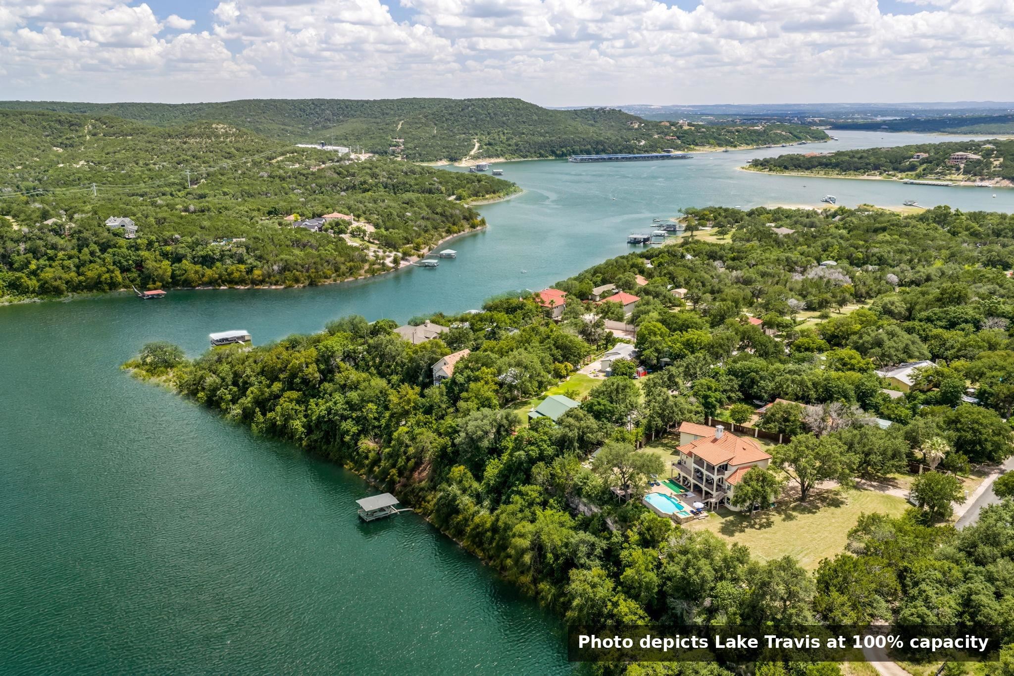 photo depicts Lake Travis at 100% capacity