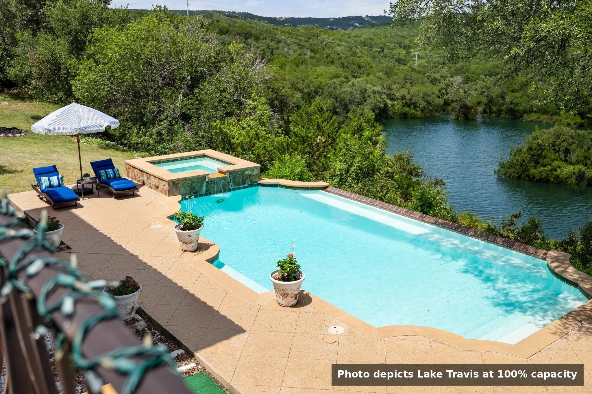 photo depicts Lake Travis at 100% capacity