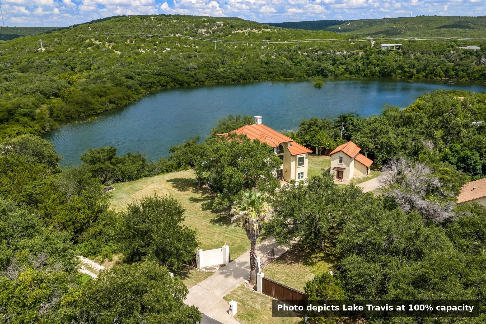 photo depicts Lake Travis at 100% capacity