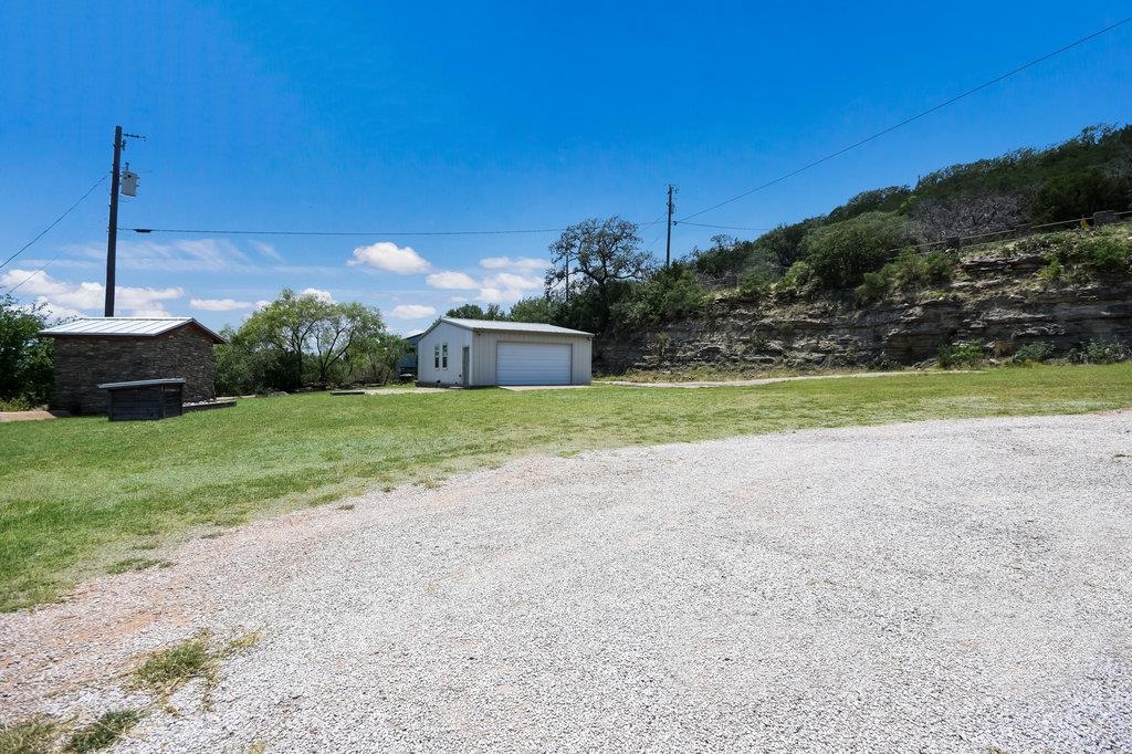 THIS METAL BUILDING IS GREAT - PLENTY OF ROOM FOR BOAT STORAGE, LAKE TOYS & WORKSHOP IN THE BACK