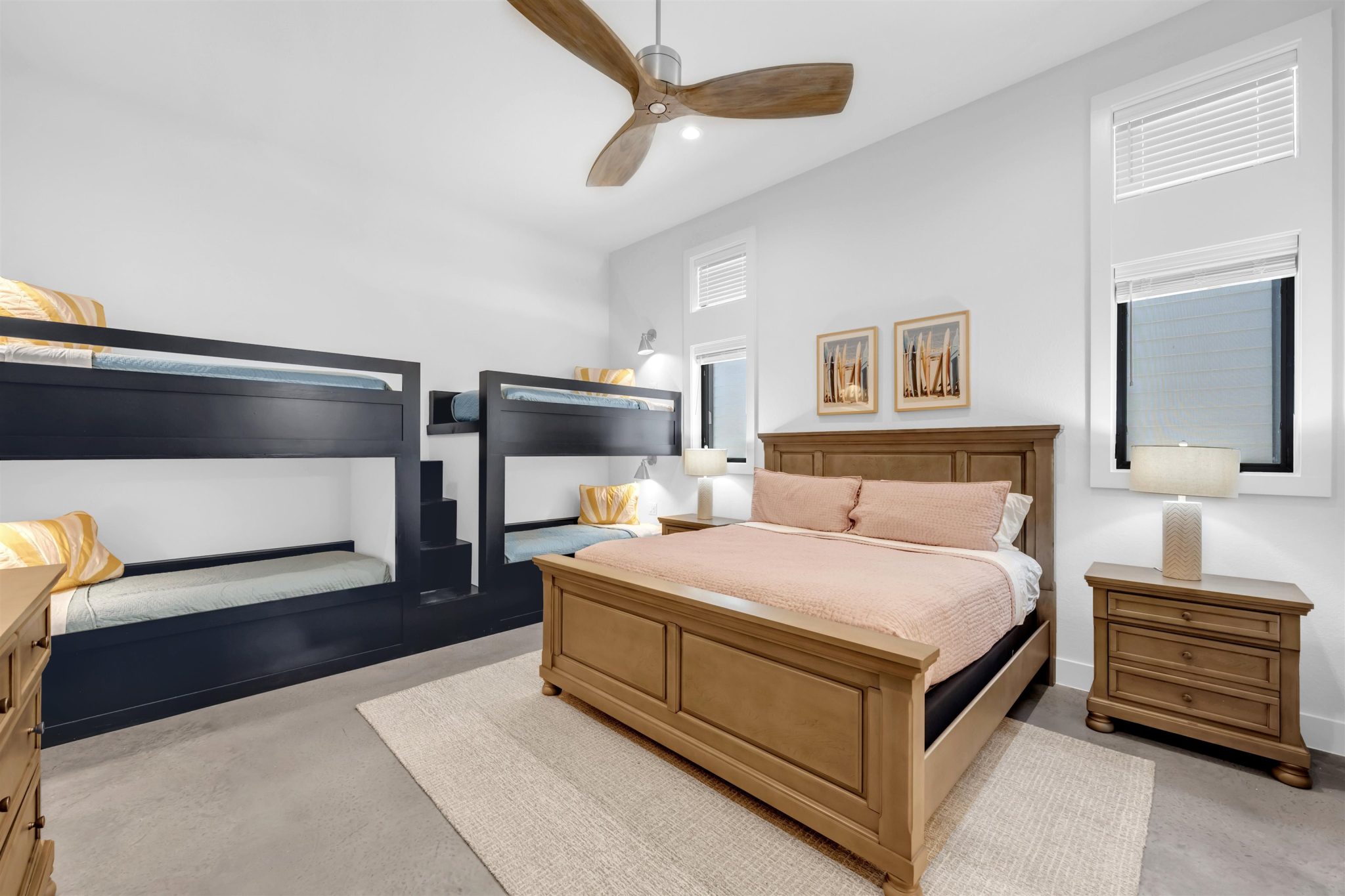 Bedroom two: High ceilings and polished concrete floors elevate this versatile, modern bedroom space