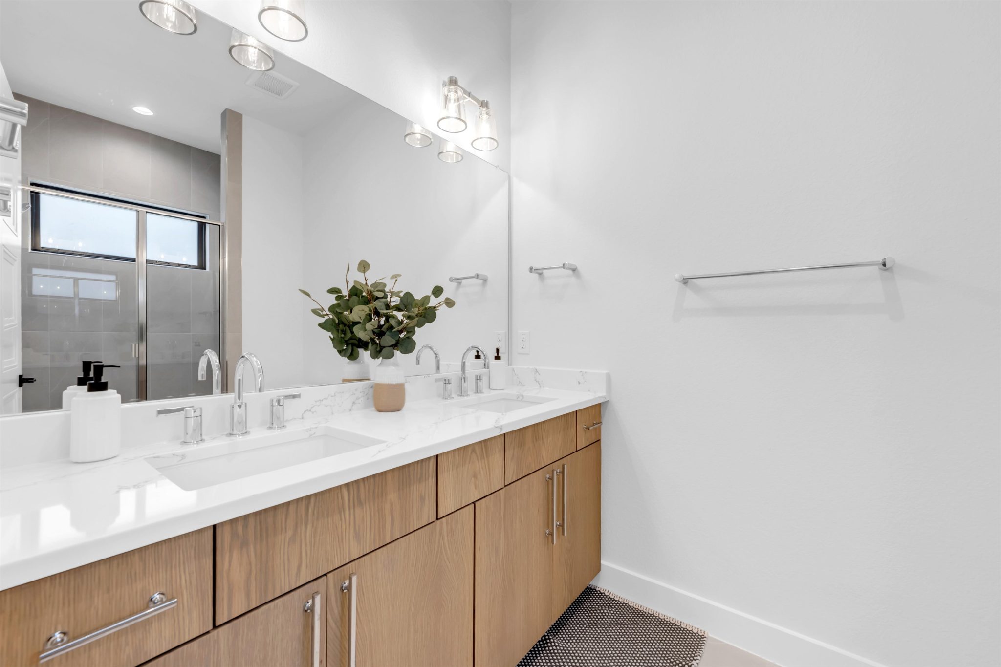 Bathroom five: Clean lines and a spacious double vanity elevate this contemporary bathroom space.
