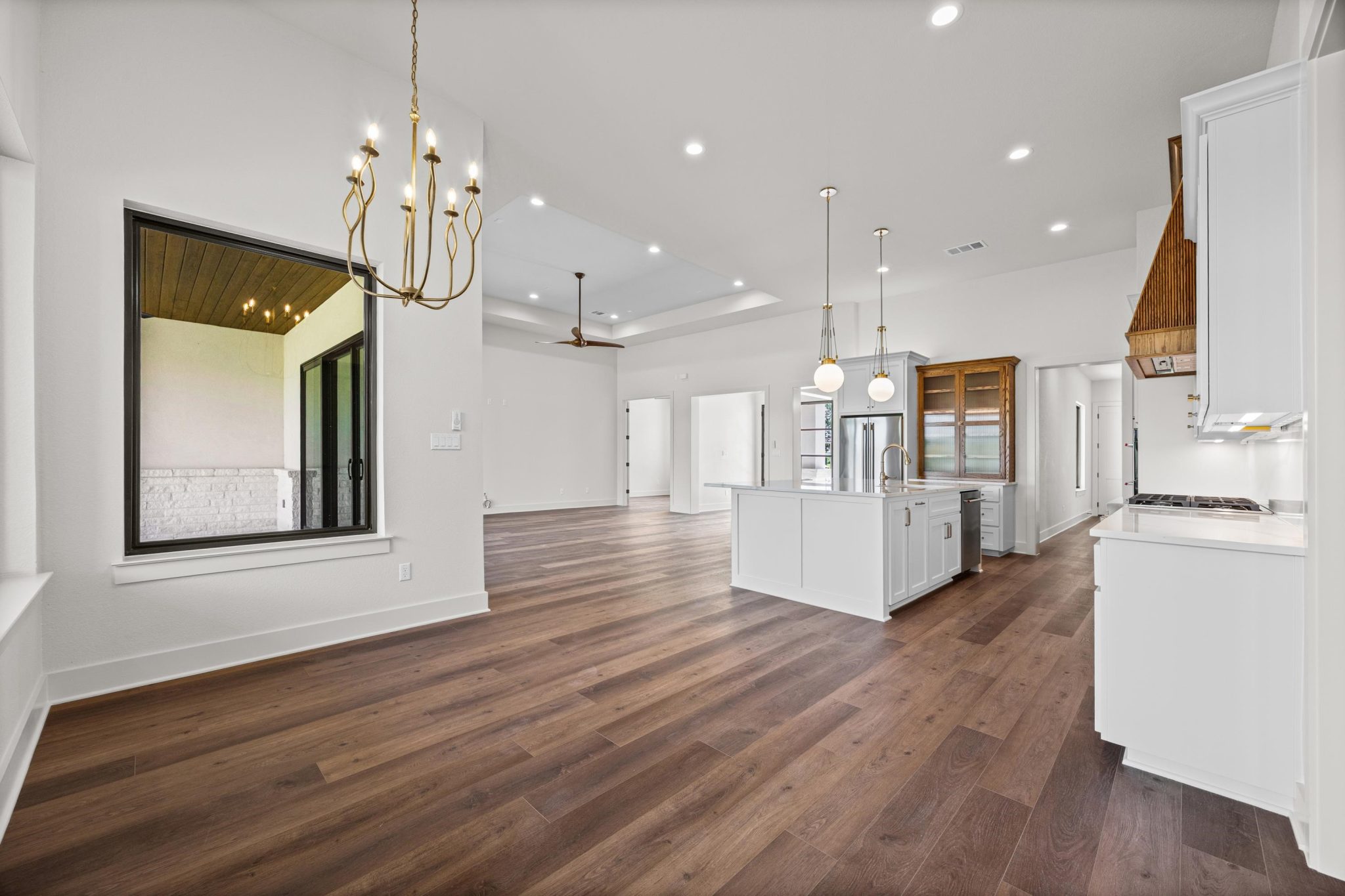 Open-concept living, seamlessly connecting the kitchen to the eat-in dining and great room