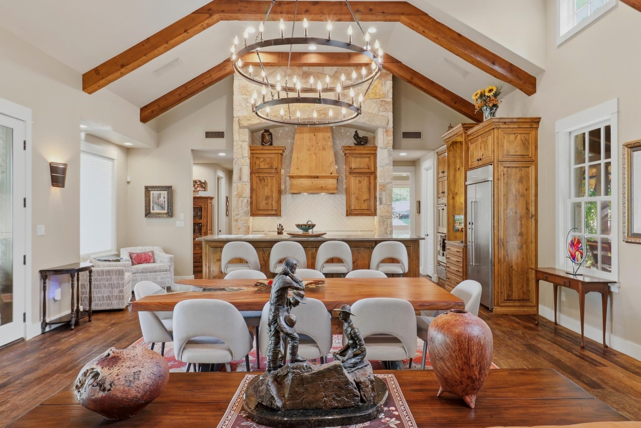 Warm architectural details give the Great Room unmistakable Hill Country character.