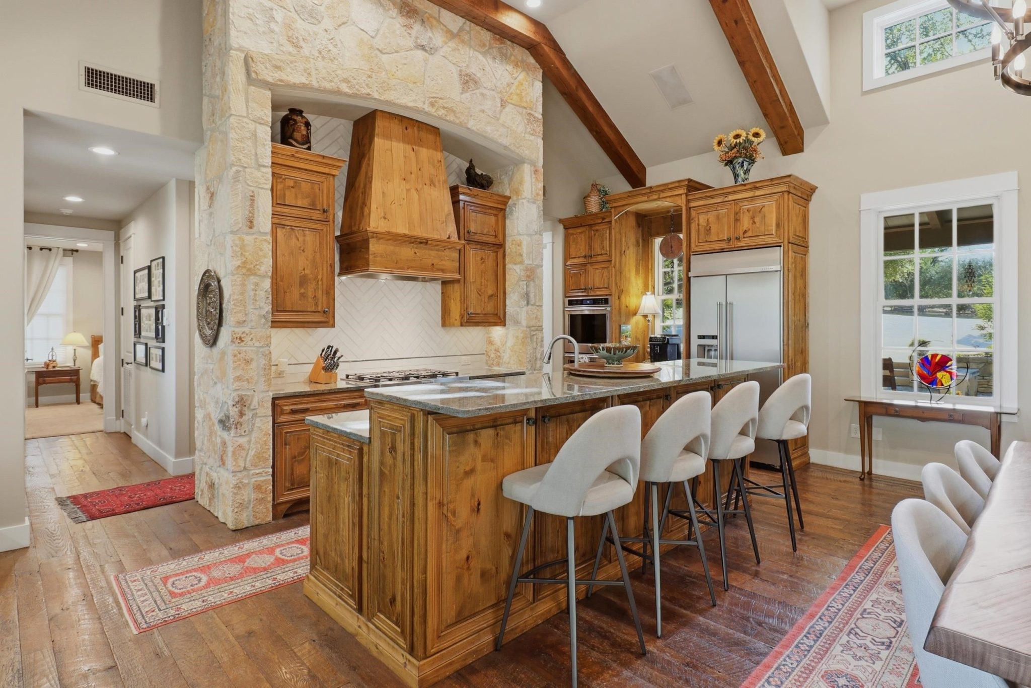 Generous cabinetry and workspace combine function with warm Hill Country style.