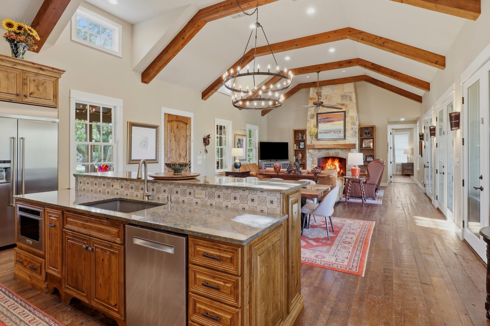 Kitchen opens naturally to surrounding living and entertaining spaces.