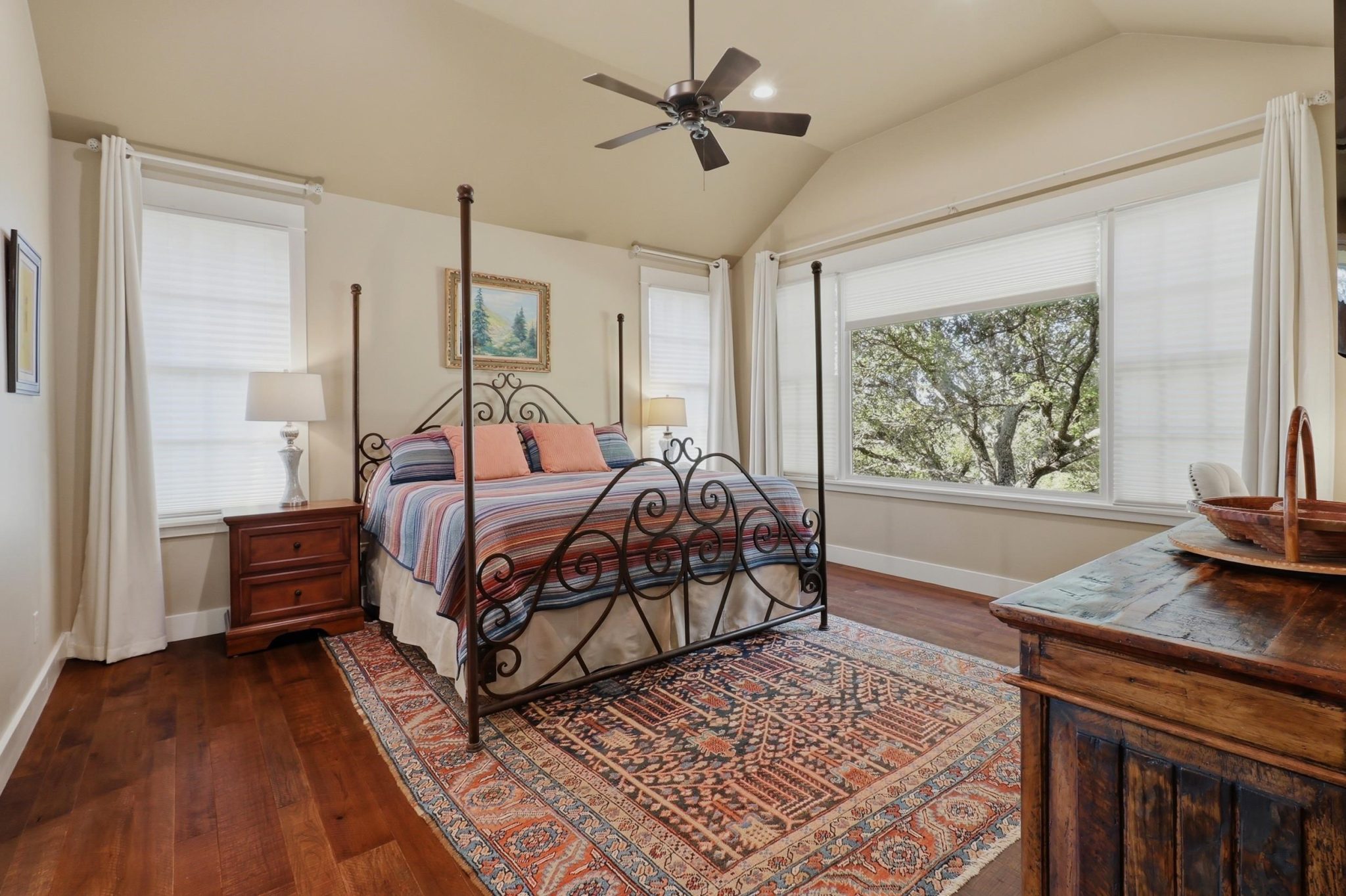 Spacious primary suite offers a peaceful retreat within the home.