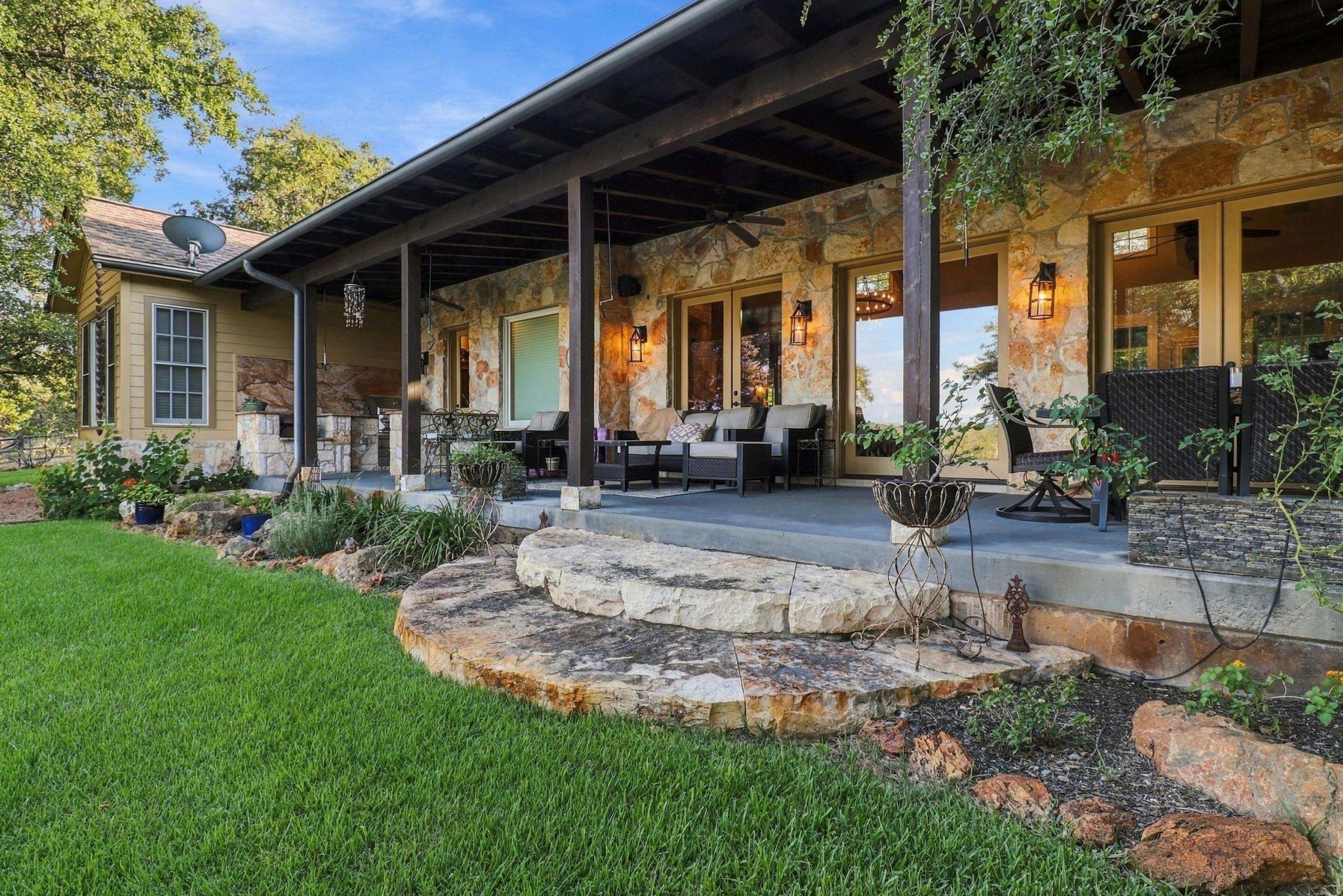 Multiple outdoor gathering areas create room for dining, lounging and entertaining.