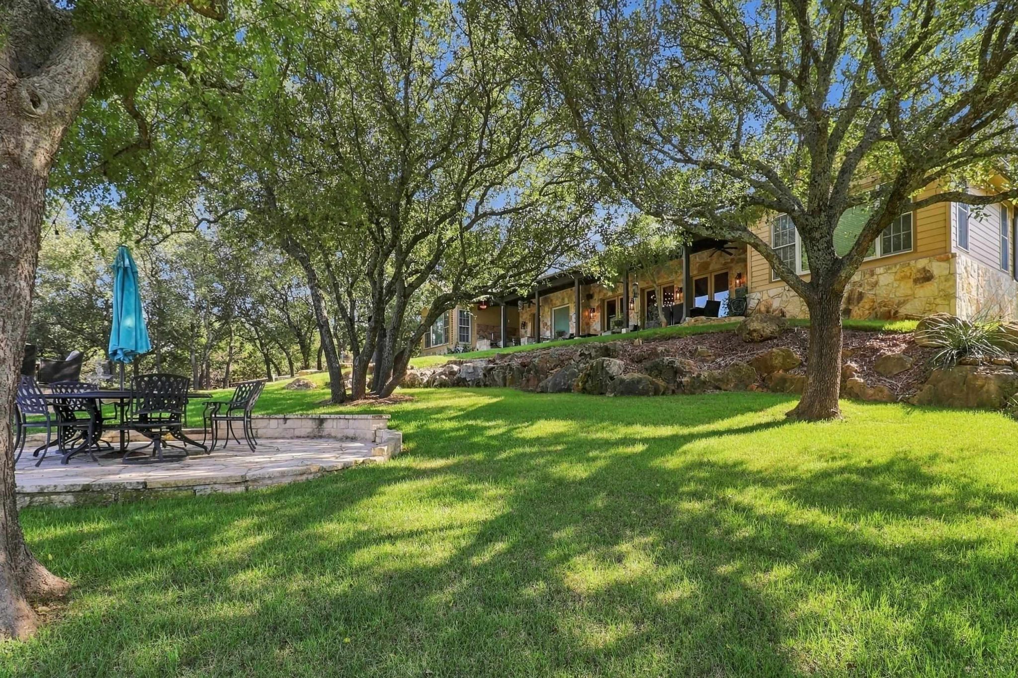 Multiple outdoor gathering areas create room for dining, lounging and entertaining.