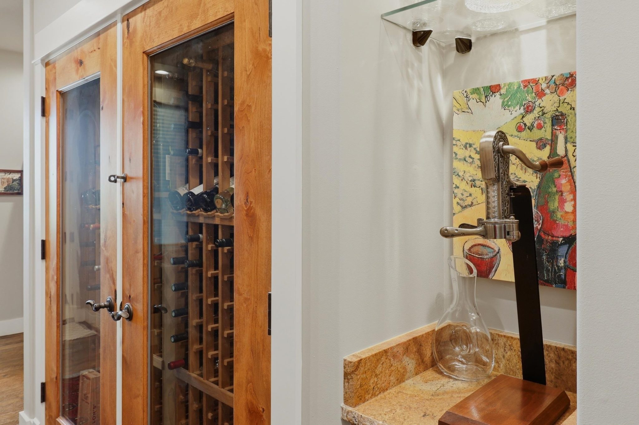 Built-in wine cooler adds convenience and character to the entertaining area.