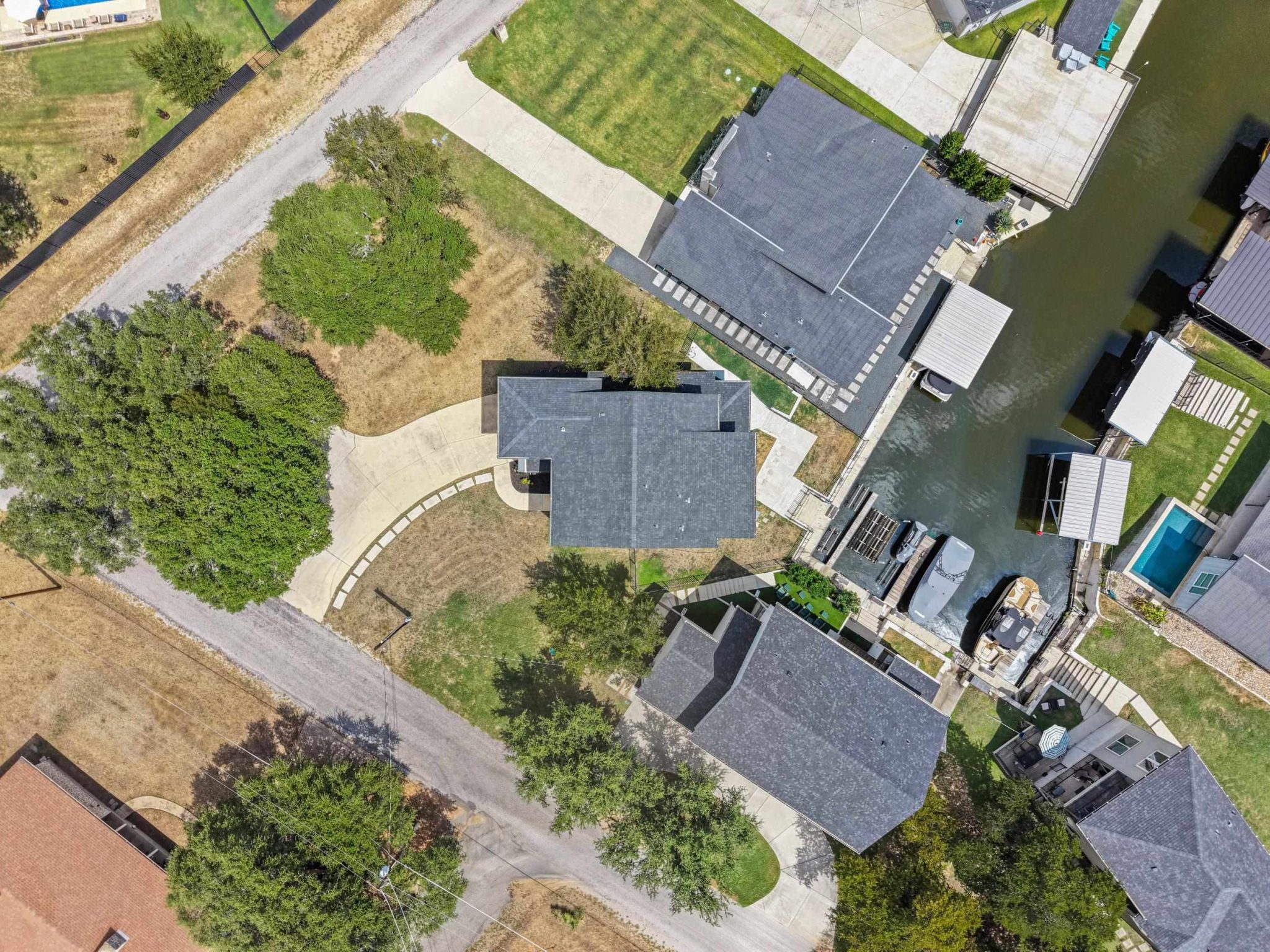 A prime canalfront location provides convenient water access directly from the backyard dock.